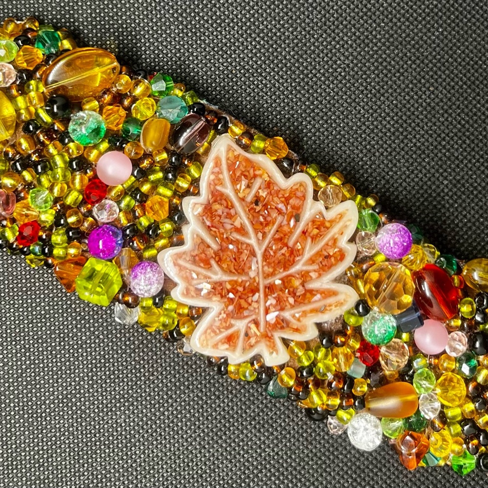 Hand-crafted bead embroidered cuff bracelet.